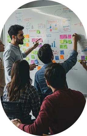 Brainmine team brainstorming a digital strategy on a whiteboard